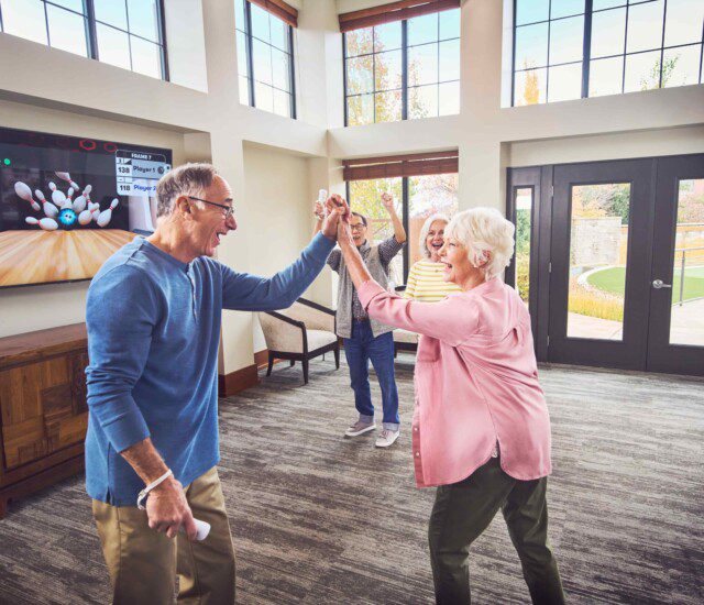 Playing Wii bowling in the Lakeside room